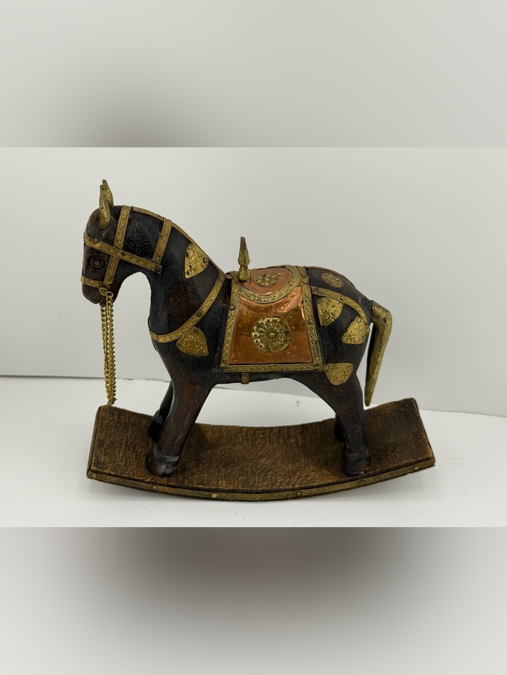 Vintage handcrafted wooden rocking horse figurine w/brass and copper details.
